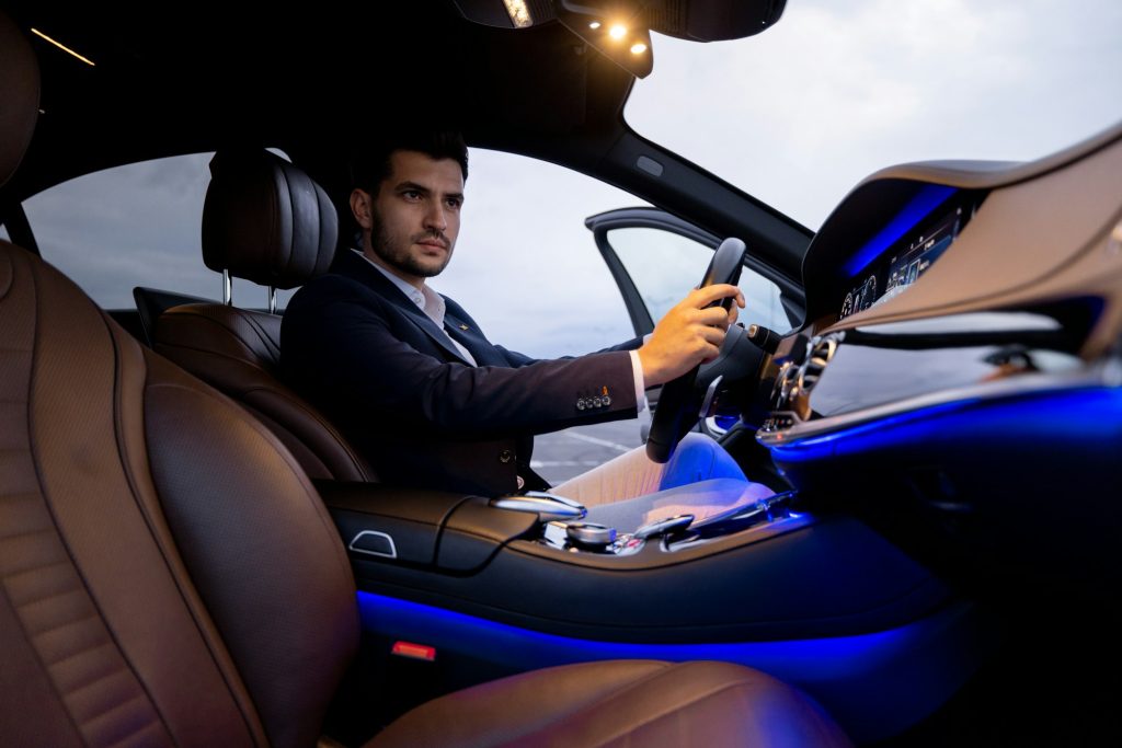 Businessman in luxury car